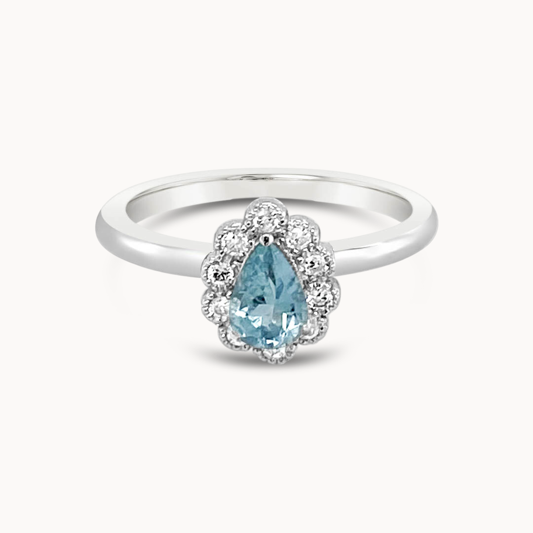 Blue Topaz Diamond Halo ring - White Gold