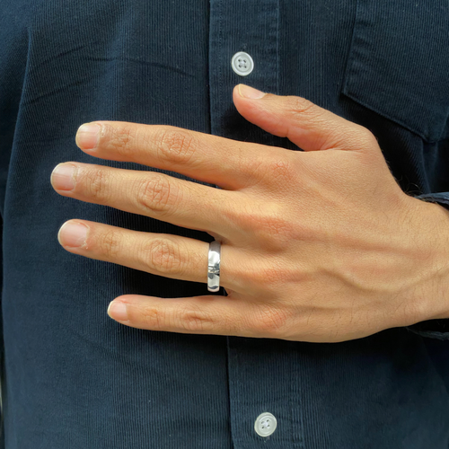 man wearing a classic court profile wedding band - Avita Jewellery