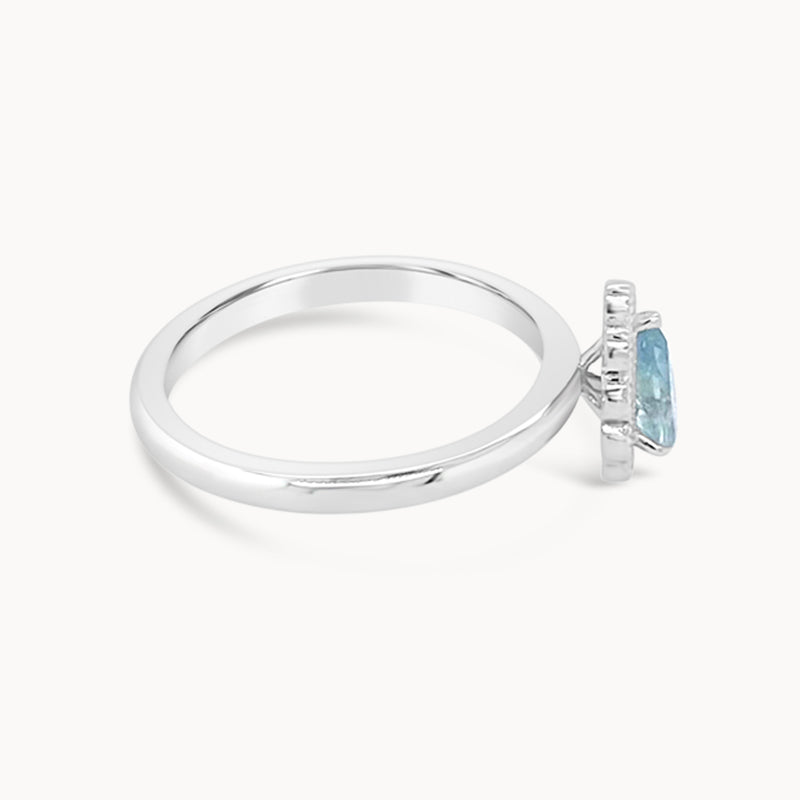 Blue Topaz Diamond Halo ring - White Gold